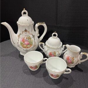 Vintage Porcelain Tea Set With Music Box Pot, Creamer, Sugar Bowl And 2 Cups